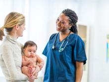 Nurse with child in moms arms