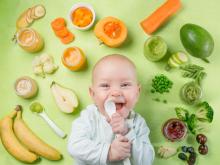 Baby with veggies